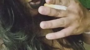 Gothic girl smoking at night and playing with belly button and showing more