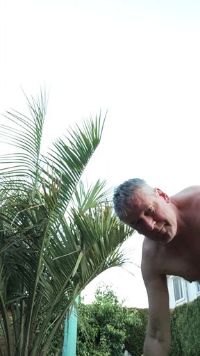 Watering my palm tree nude
