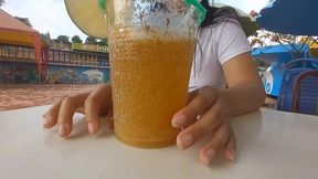 Sexy flaquita with huge backside handles a drink and sucks a stranger's cock in public