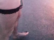 Just fishnet stockings and extreme ball weights on street