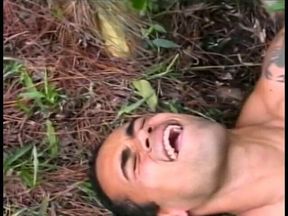 Young Latino gets drilled by a gay stud lying on a tree trun