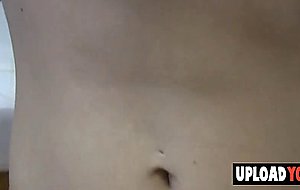 Busty chick gets nude in the kitchen