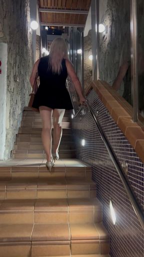 Astrid on the stairs on holiday in heels