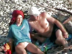 Spooning position on the beach (aunt and lover)