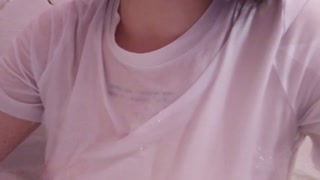 having fun in the bathtub with foam in a wet white top. I smoke and listen to 2rbina2rists