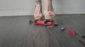 Giantess goddess Charlie Caroline Crushes a 1991 Pontiac Firebird in mega Wedges with painted toenails close ground view