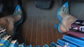 Fifi playing with the pedals then driving in clear blue high heels that see through to her silver toe rings