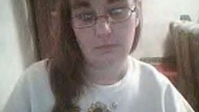 Nerdy redhead BBW webcam chick shows off her huge tits