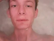 Very skinny teen shows himself putting his head underwater