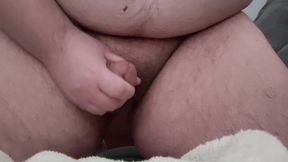 Superchub kneeling and stroking in bed