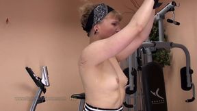 Sara,sexy blonde in the gym gets bare back whip