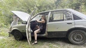 Anastasia revs old Opel and plays with exhaust fumes