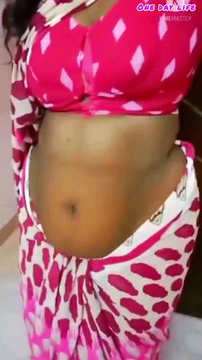 A cuckold husband admires the beauty of his sexy Desi wife after asking her to wear a saree.