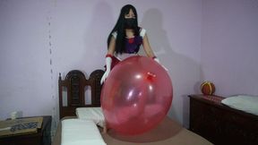 Sailor Mars rides to pop big balloons