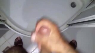 Gay man masturbating with large penis