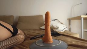 Big butt blondie shaking her ass and riding dildo on a plexi chair