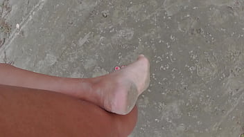 Walking down the street and on the beach barefoot getting your feet dirty - Foot fetish