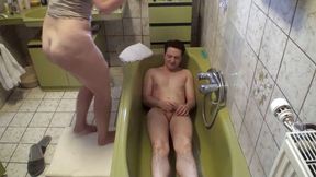 Jerking off receiving her piss