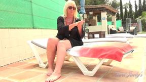 Busty Mature Woman Enjoys Sunbathing and Fingering by the Poolside