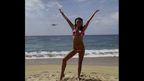 Monika Fox Poses In Pink Bikini With Stars On Beach
