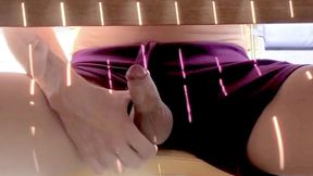 Exhibitionist jerks off under the table outdoor