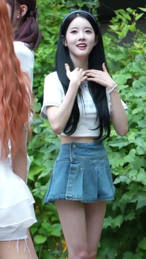 K-pop star in denim skirt