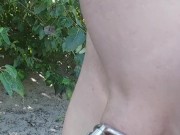 Completely, permanently hairless slave at a public nude beach
