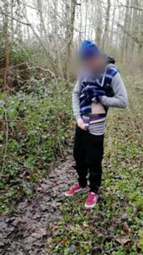 Boy jerking off and cumming on a forest trail