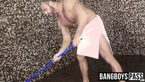 ”Man with muscles is stroking his giant shaft under the shower”