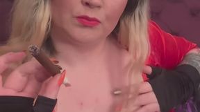 BBW applying lippy and smoking a cigar