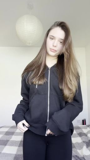 Young woman in black hoodie