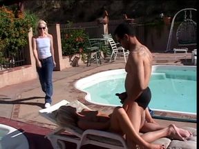 Blonde bitch gets banged in her both holes near the swimming pool