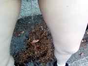 Pee in shorts on the street while it rains