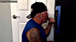 Gloryhole homemade DILF with tattoo sucks and jerks cock