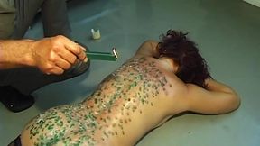 Mature redhead MILF gets a sound spanking while naked and exposed.