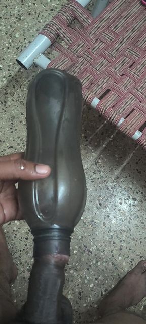 Indian Man Inside The Water Bottle Enjoys Sunni