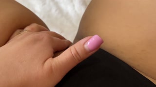 MILF moans while masturbating