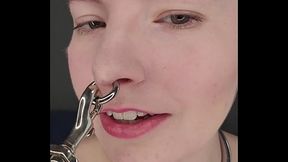 Now that my septum ring is bigger it can bear more weight on it, including a heavy chain leash....