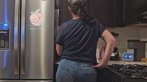 Mama is brewing something in the kitchen