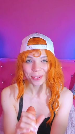 Redhead teen sucking dildo