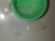 Nut in the top of a baby oil bottle top..