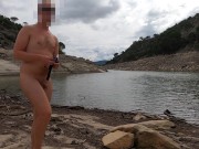 Guy swims with anal plug in lake