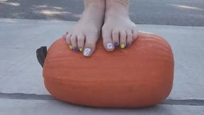 Crushing a pumpkin with my bare feet &mdash;  stomping hard and breaking it apart