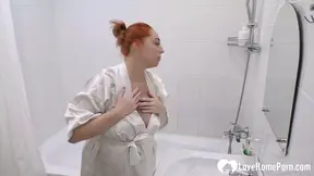 Pregnant Beauty Pleasures Herself in the Bathtub with a Round Belly