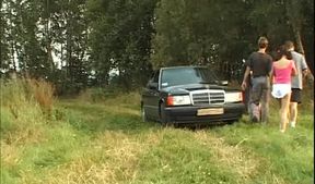 Mature Brunette Devours Cock in Wild Outdoor Group Bang