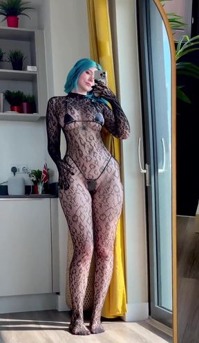 Micro bikini babe in fishnet leather