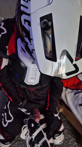 An Excited Guy in Motorcycle Gear Fucks His Sneakers