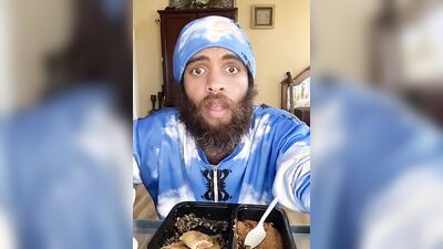 Cute Latino with a sexy beard does a food review