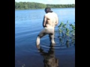 jerking off in lake wearing spandex tights, latex gloves and stocking mask