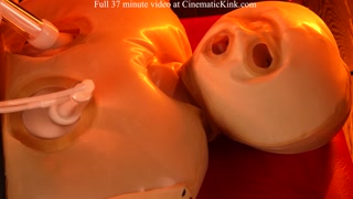 Isabel Love in inflatable latex sack